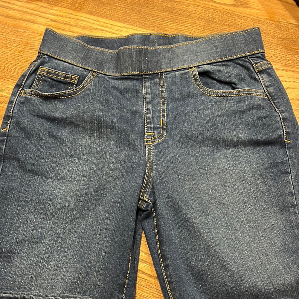 These are dark was jeggings. From Cat and Jack. Girls size 16. Dark wash.